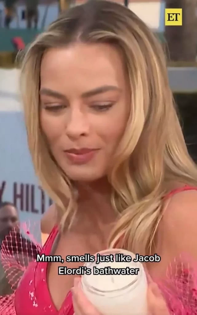 Margot Robbie sniffs bathwater candle after intrigued by raunchy movies 1